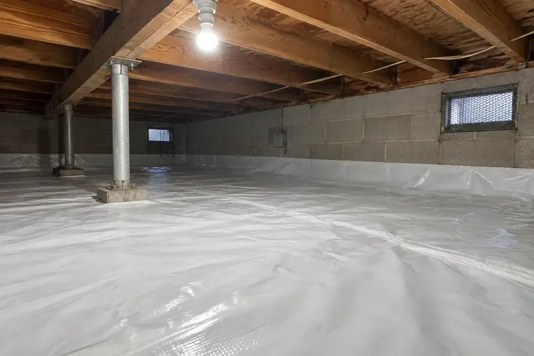 Crawl space cleaning with standing water drain and seal, after: Ensuring a dry, clean environment that prevents moisture and pest issues.