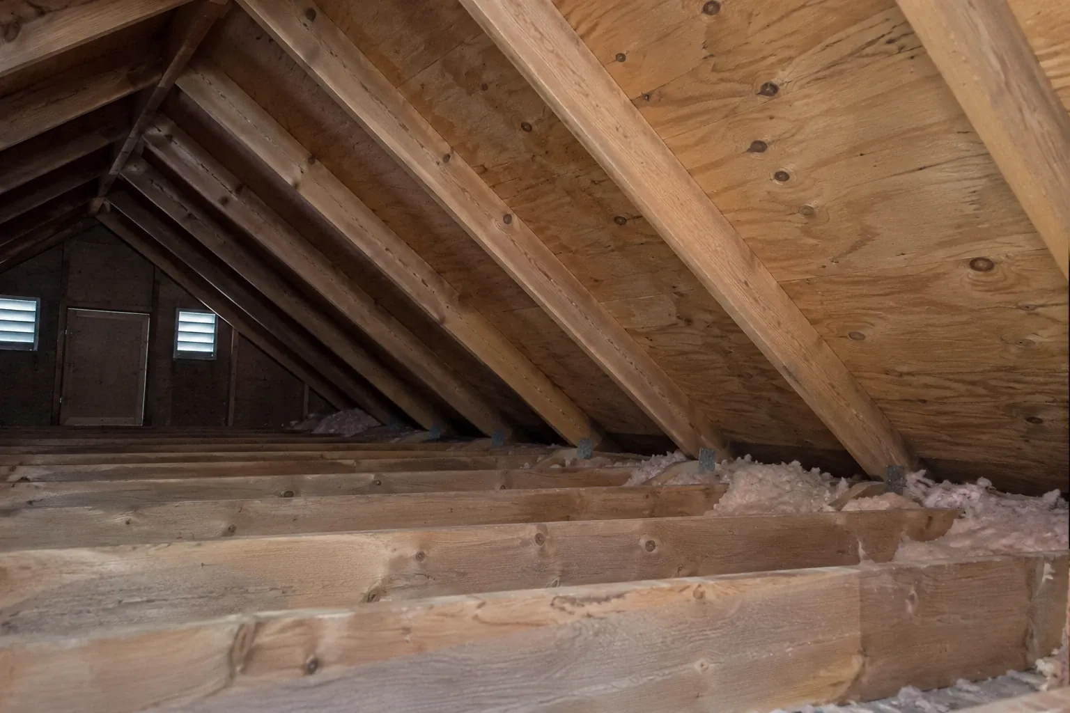 After: The mold remediation is complete with the attic sheathing clean, dry, and sealed, restoring a healthy environment without structural changes.